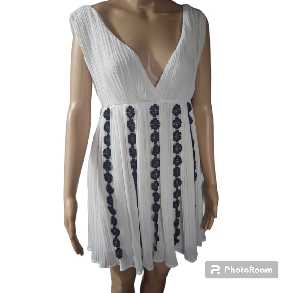 Holy Cody studio white sleeveless dress. Very flowy. Size large